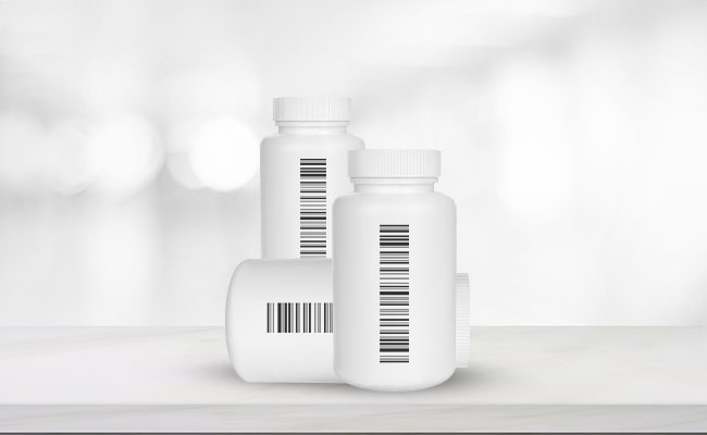 White pill bottles with lot tracking barcodes